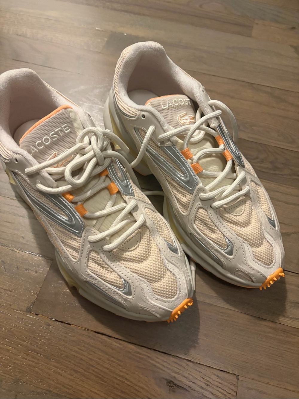 Lacoste Mens Sneakers with Orange Accents and Silver Details